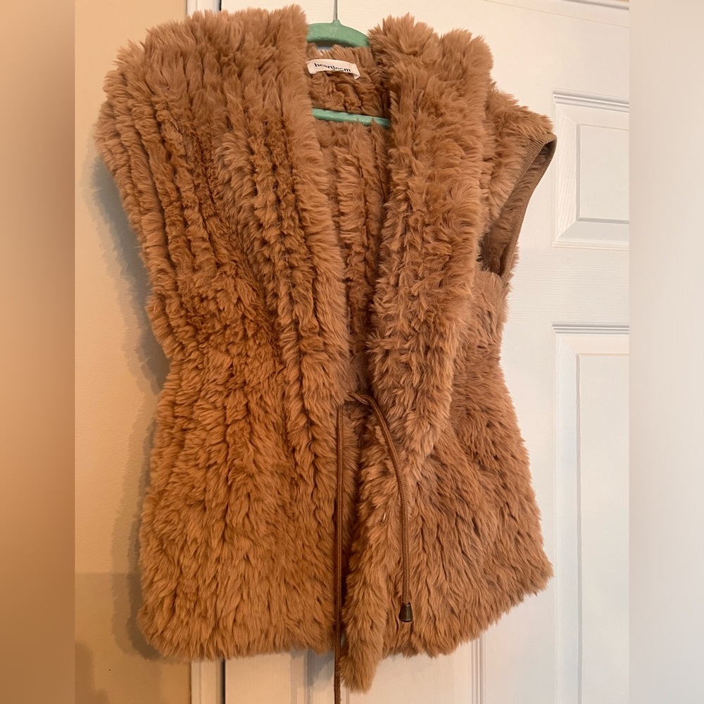 Heartloom fur vest with hood.